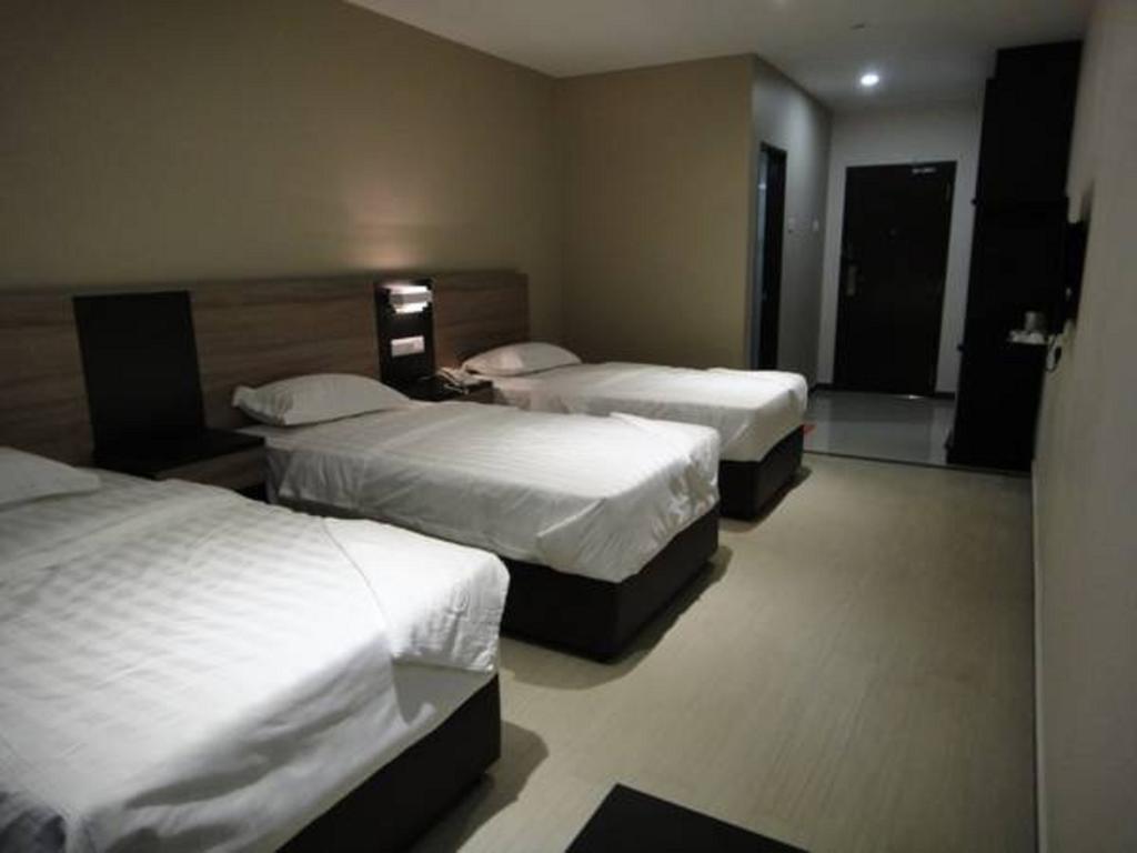 Galaxy Hotel Simpang Ampat  Номер фото