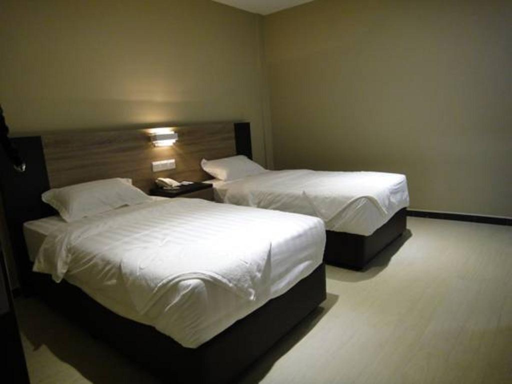 Galaxy Hotel Simpang Ampat  Номер фото